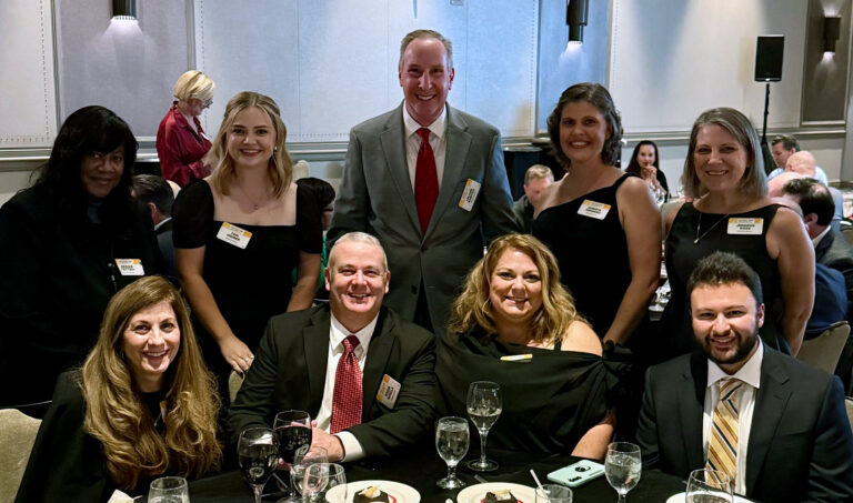 The iMPROve Health team smiling and posing together at the Modern Healthcare Awards gala.