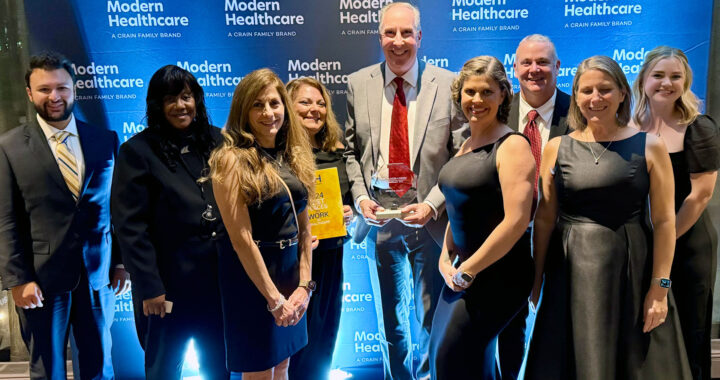 Team members from iMPROve Health celebrating their achievements at the Modern Healthcare Awards gala.